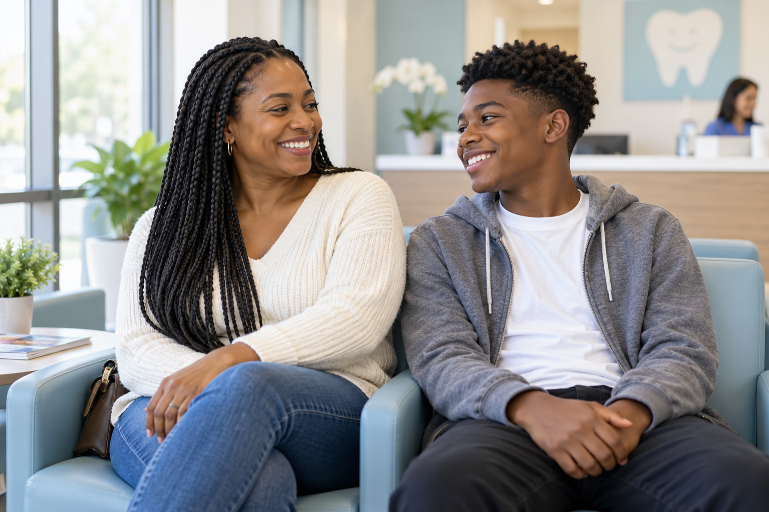 Mother and teenager visiting the dental office