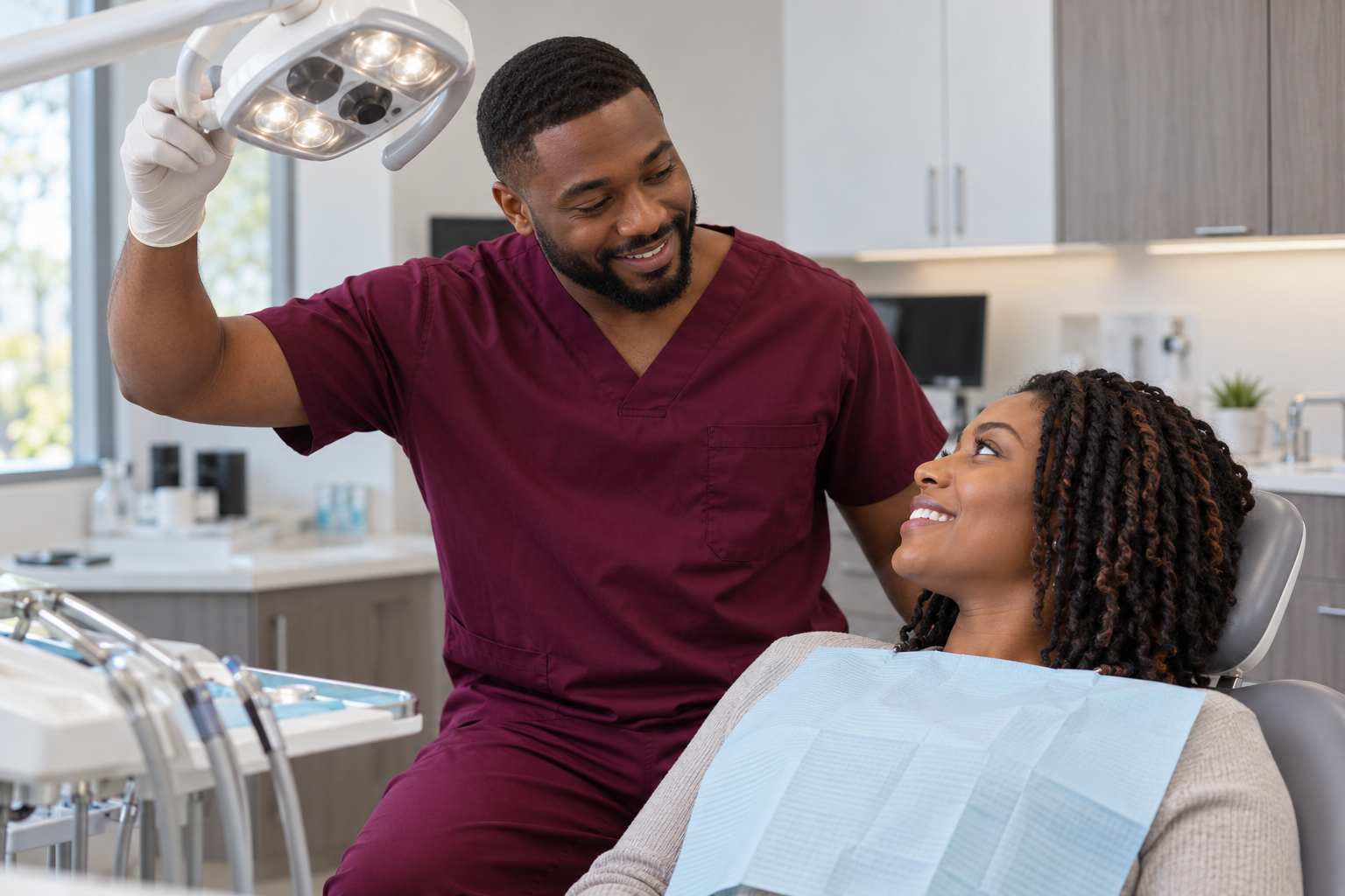 Dentist preparing a patient for treatment